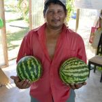 Julio with two watermelons